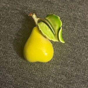 60’s enamel pear brooch with leaf. Has green hues & no enamel wear & gold stem.